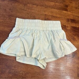 Free People FP movement get your flirt on light yellow shorts size XS